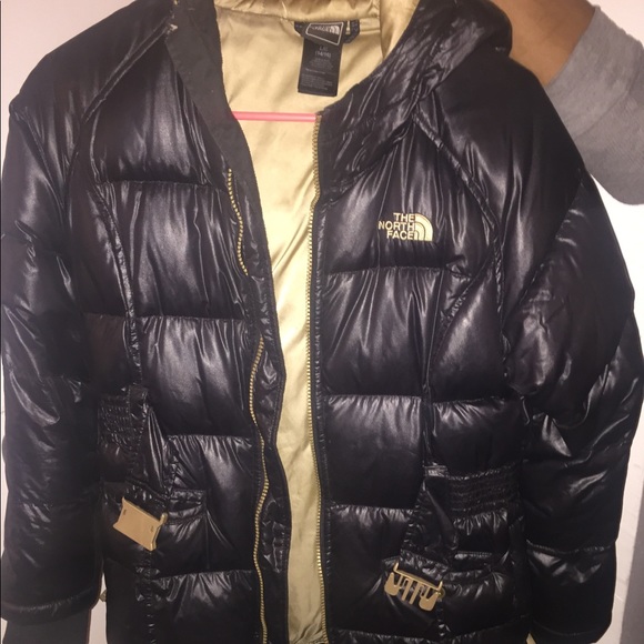 black and gold north face jacket